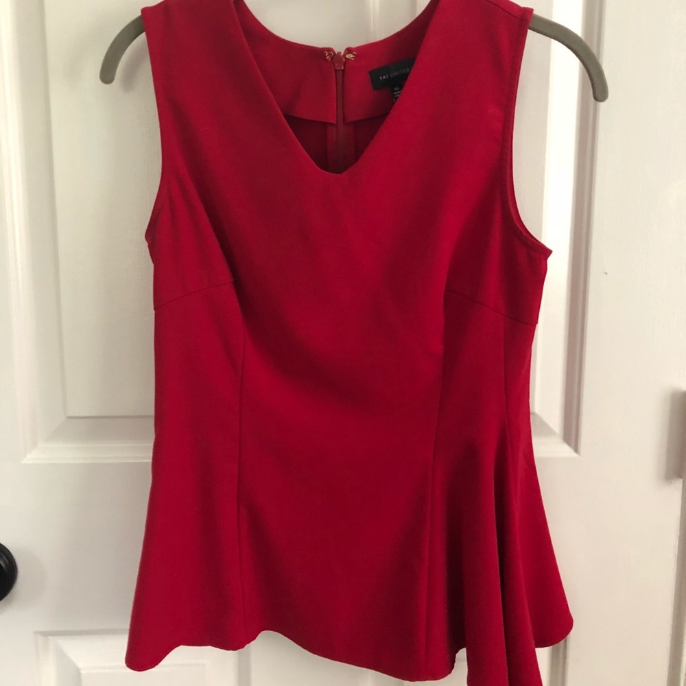 The Limited asymmetrical top